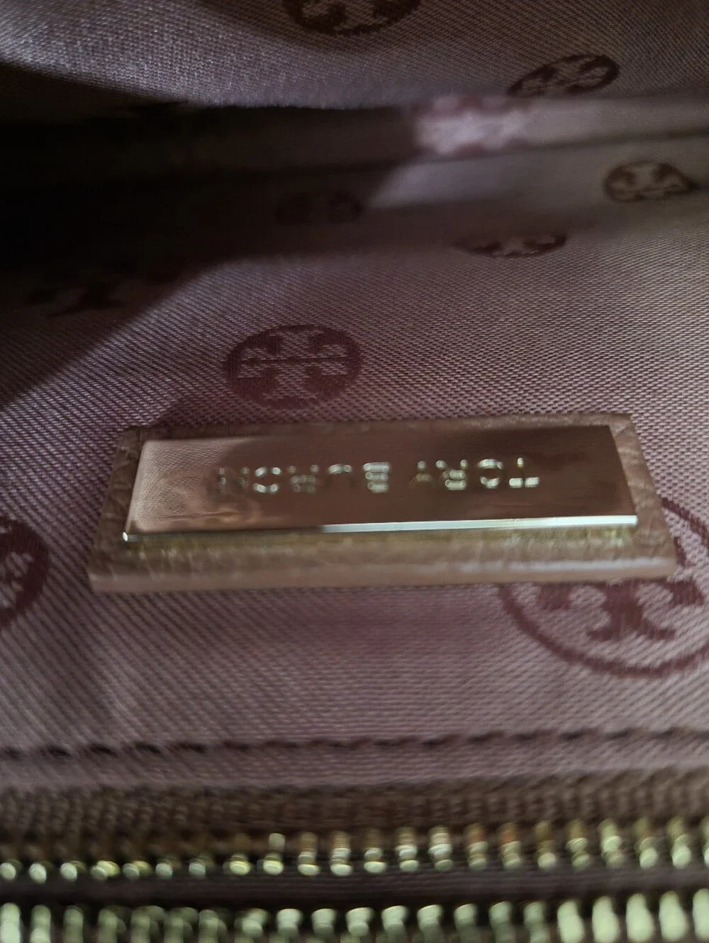 Tory Burch securely metal hardware